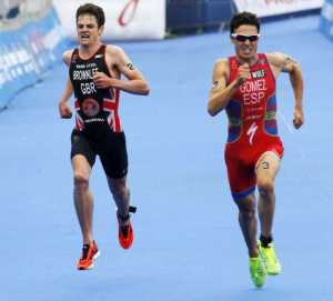 Spain's Xavier Gomez races Britain's Jonathan Brownlee to win the men's race in the ITU World Triathlon Series, at Hyde Park in London